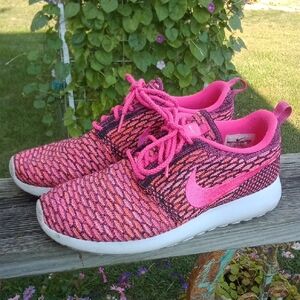 Nike Women's Vibrant Pink and Black Sneakers